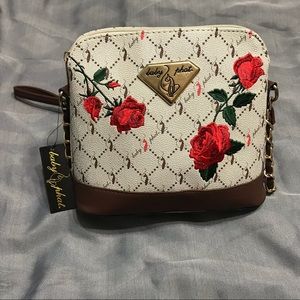 Baby Phat Rose embroidered purse.